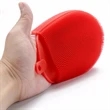 Elliptical dishwashing brush